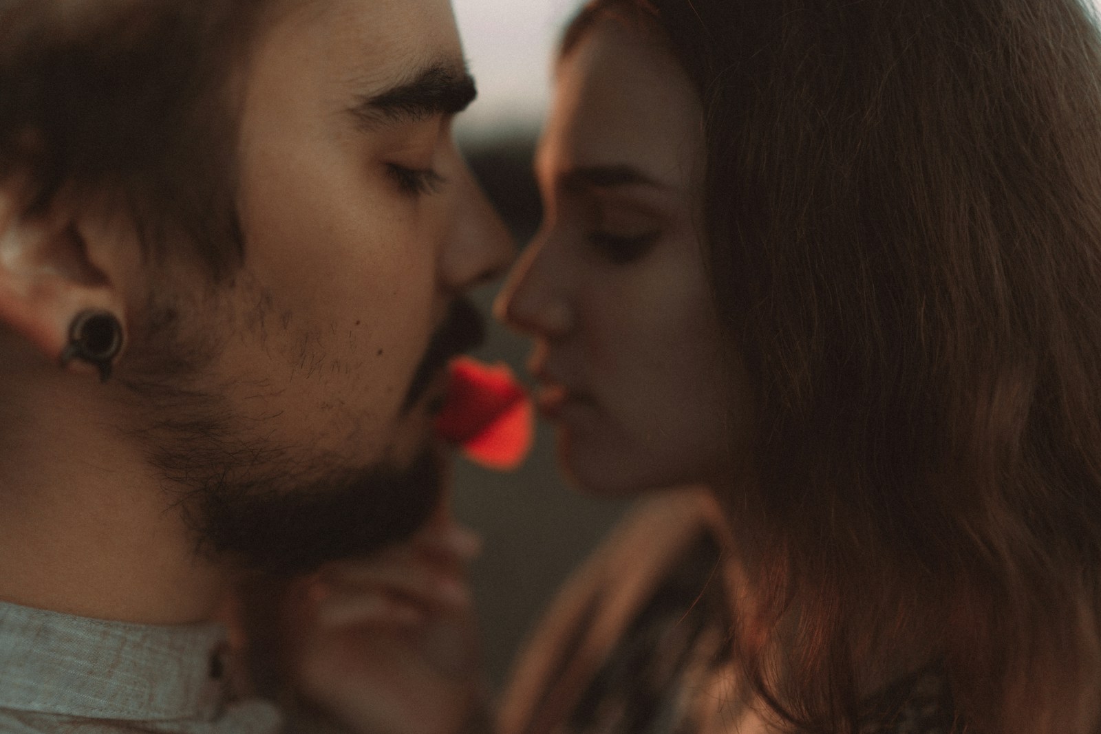 a man and woman kissing
